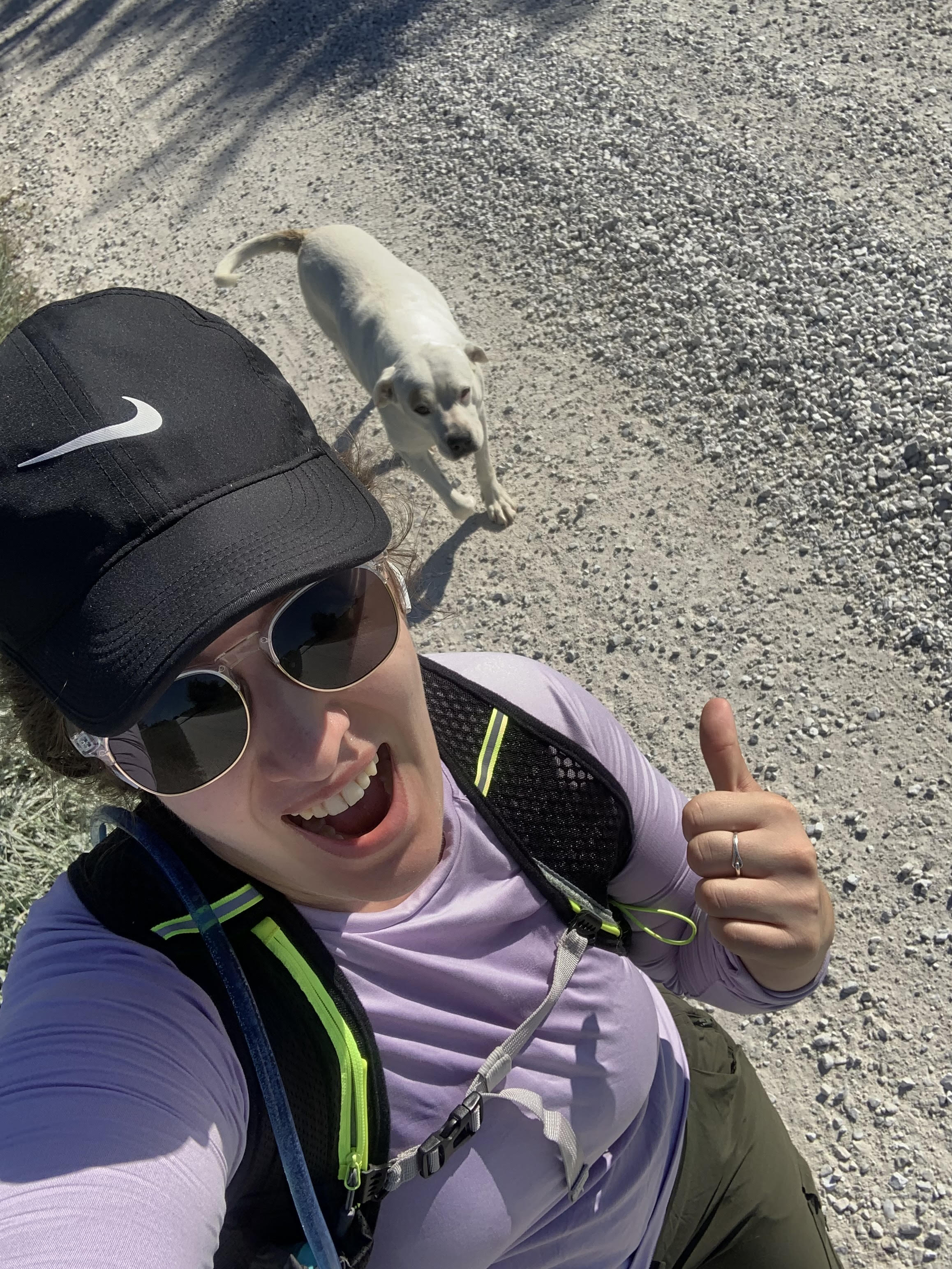 Me with a white dog that started following me during a run.