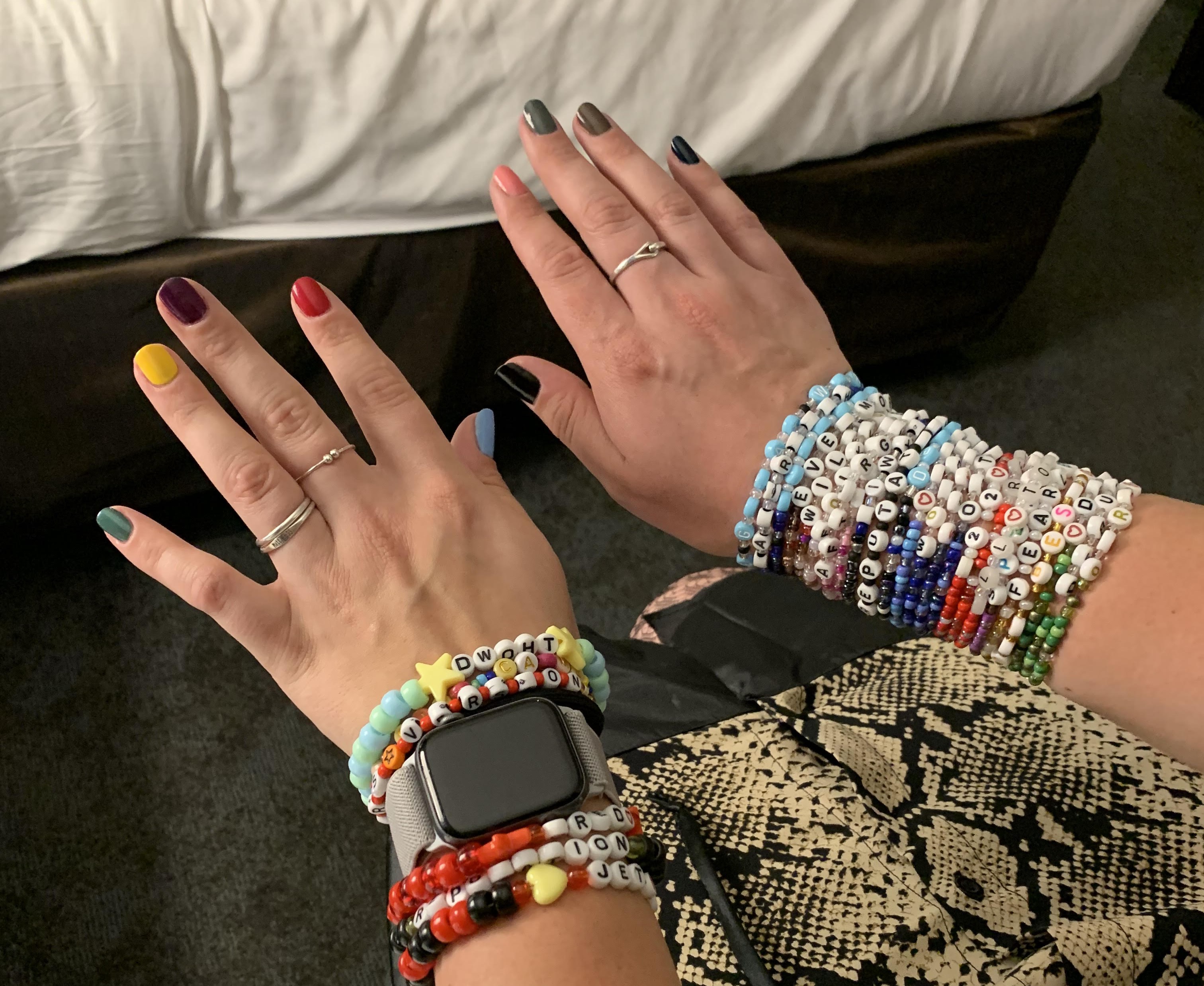 Me with six inches of friendship bracelets on both of my wrists right before the Taylor Swift Eras Tour.